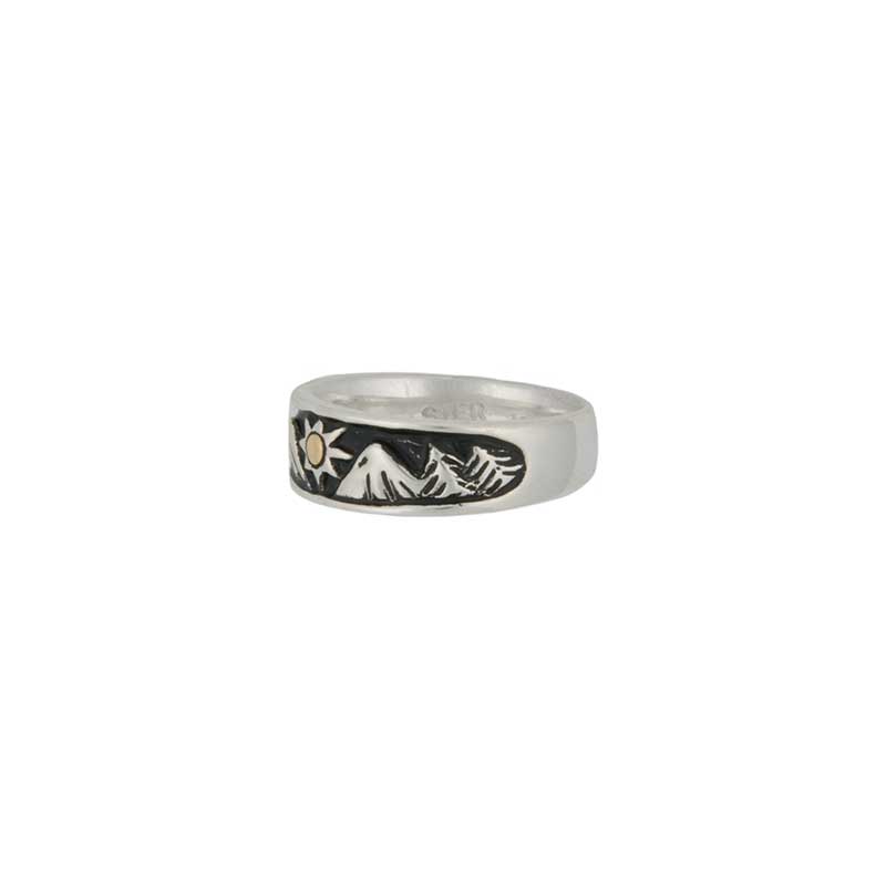 Mountain Sunrise Ring.  One side of the ring shows cedar trees.
