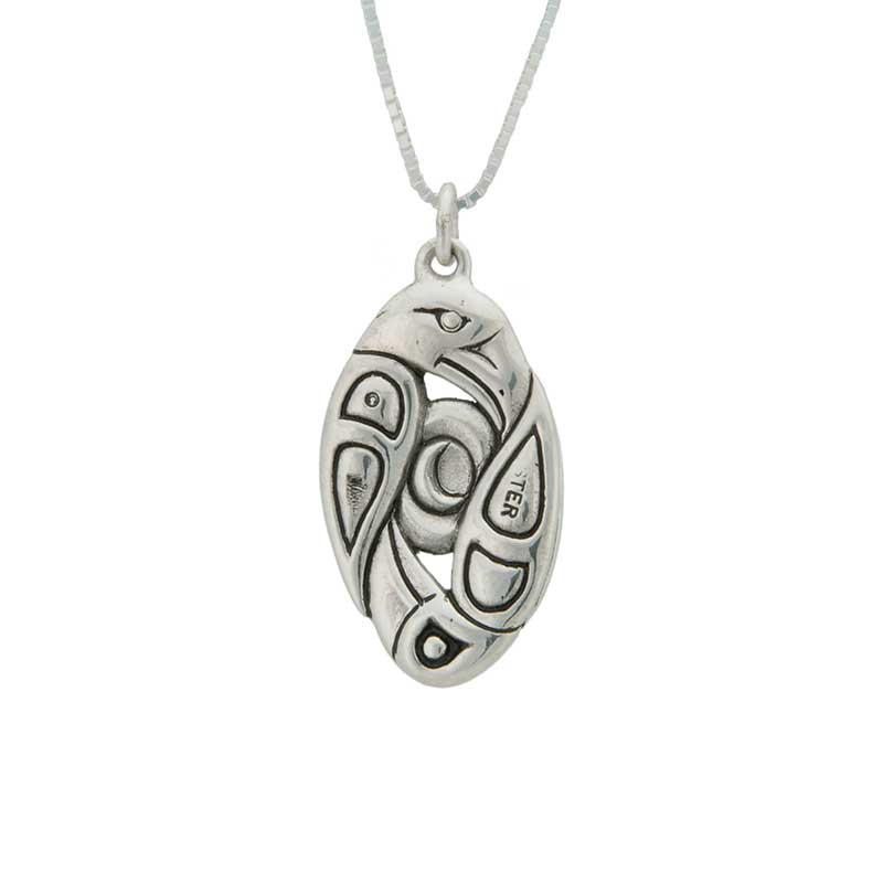 Reverse Side, Raven and Eagle Pendant, Sterling Silver. The reverse side of the pendant shows the moon.