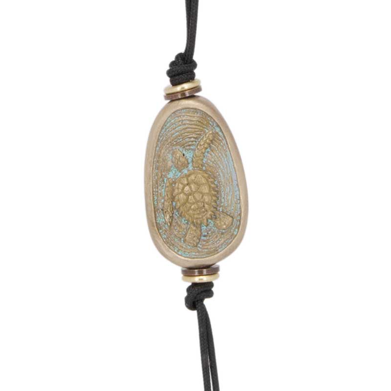 Sea Turtle Amulet Zipper Pull : The amulet features a sea turtle.