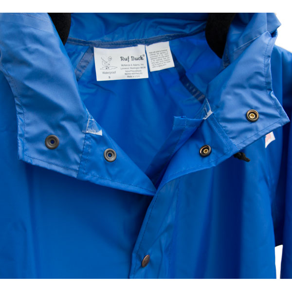 The Ruf Duck Rain Jacket has a snap closure double storm flap.