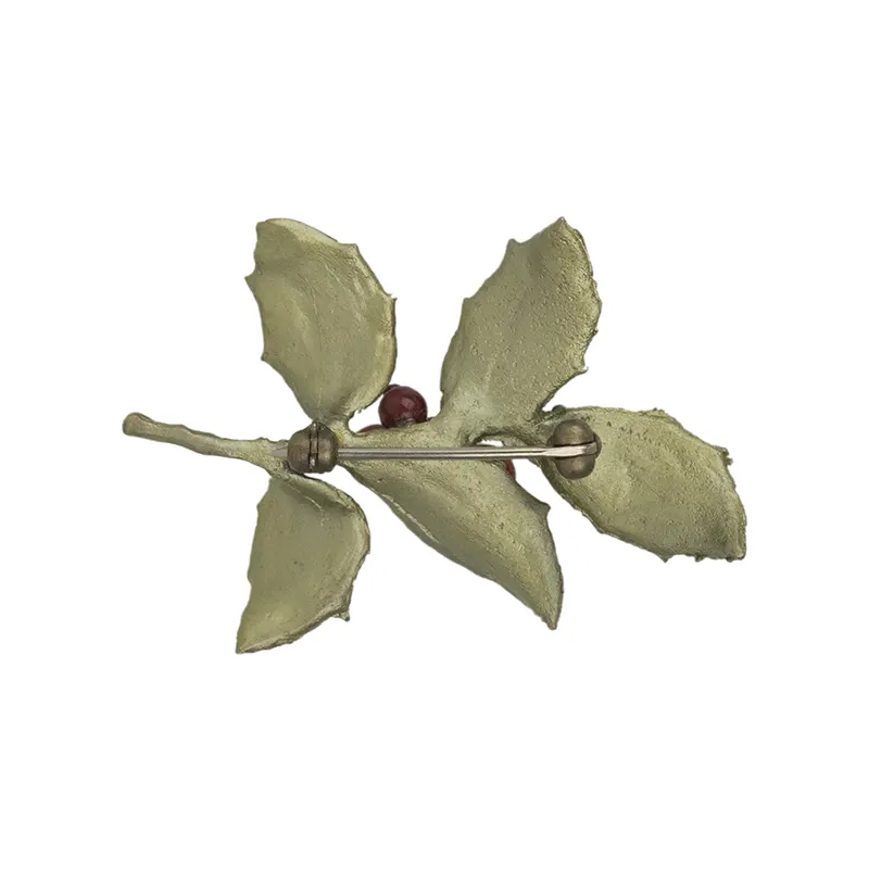 Holly Pin by Michael Michaud. The pin fastens with a bronze clasp.